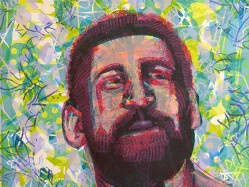 Monoprint of the face of a man with beard over pastel colore abstract background